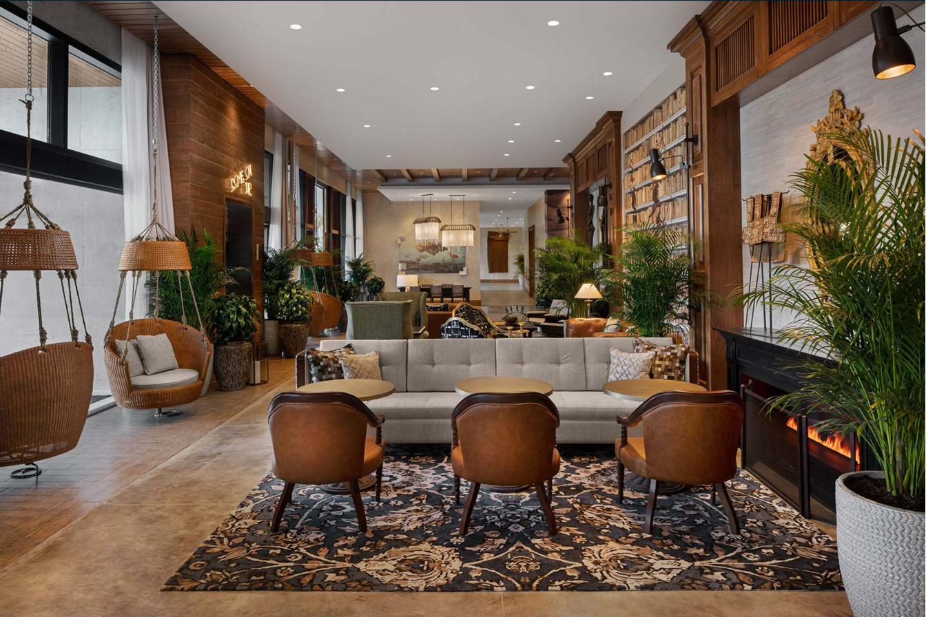 Completed hotel lobby installation with full furniture, lighting, and decor in place
